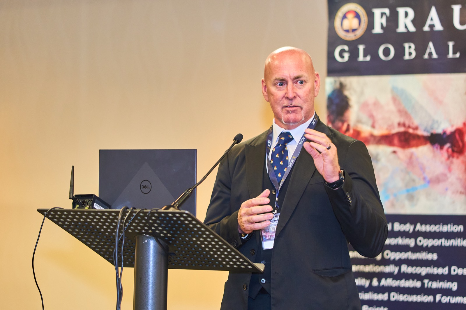 A speaker presenting at the ACFE Imbizo