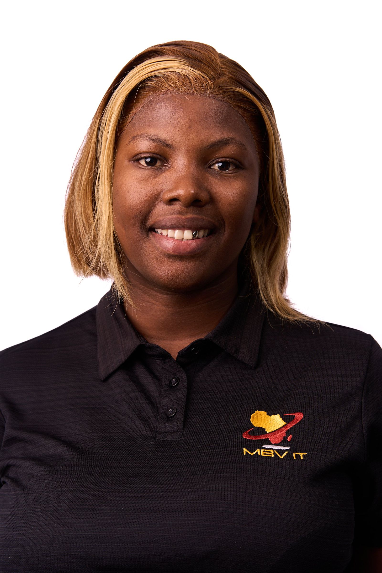 A staff portrait against a plain studio ground