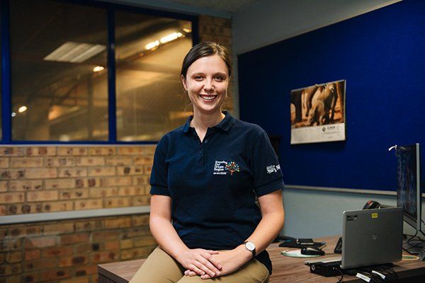An employee at her desk during the recruitment campaign shoot